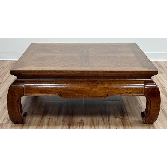 Stunning vintage rich walnut Ming leg coffee table. Timeless shape that marries with a wide range of design aesthetics....