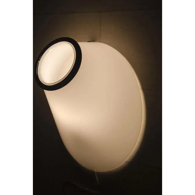 Special vistosi wall lamps. Eight pieces in stock, one with a red rim. In good vintage condition. Measurements h: 18cm. B:...