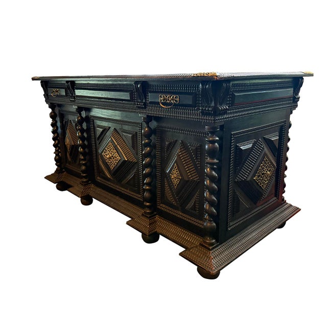 Hand Carved Portuguese Desk with traditional moldings and spindles and brass ornaments. Made of native walnut. This desk...