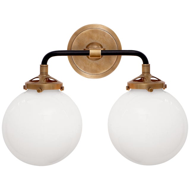 Bistro Double Light Curved Sconce in Hand-Rubbed Antique Brass and Black with White Glass Designer: Ian K. Fowler Height:...