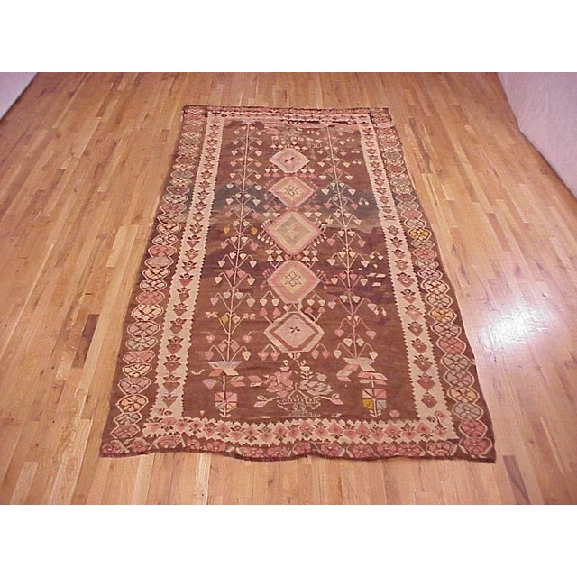 A vintage bessarabian Kilim oriental rug in khaleghi (gallery) size, size 11'3 x 5'6, circa 1930. This handsome handmade...