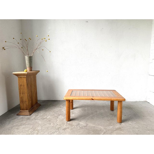 1970s Scandinavian coffee table in solid pine, reminiscent of Rainer Daumiller's designs. It embodies the hallmarks of...