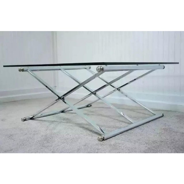 Vintage Maison Jansen Style Triple X-Frame Mid Century Modern Chrome & Glass Square Coffee Table. Circa Late 20th Century....