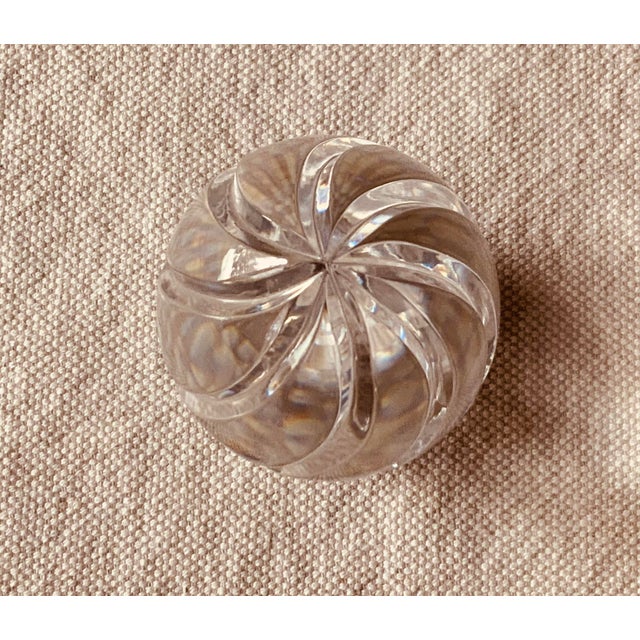 … The Romance of Form In the hands of French crystal artisans of the mid-20th century, even the humblest paperweight...