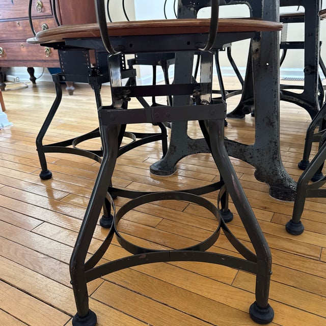 1940s Rare 8 Matching Original Toledo Stools With Custom Table Made From Vintage Work Table Top and Unique Iron Legs For Sale - Image 5 of 12