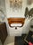 The product is a 19th century Italian inlaid mahogany wall console, featuring intricate designs and craftsmanship. This...