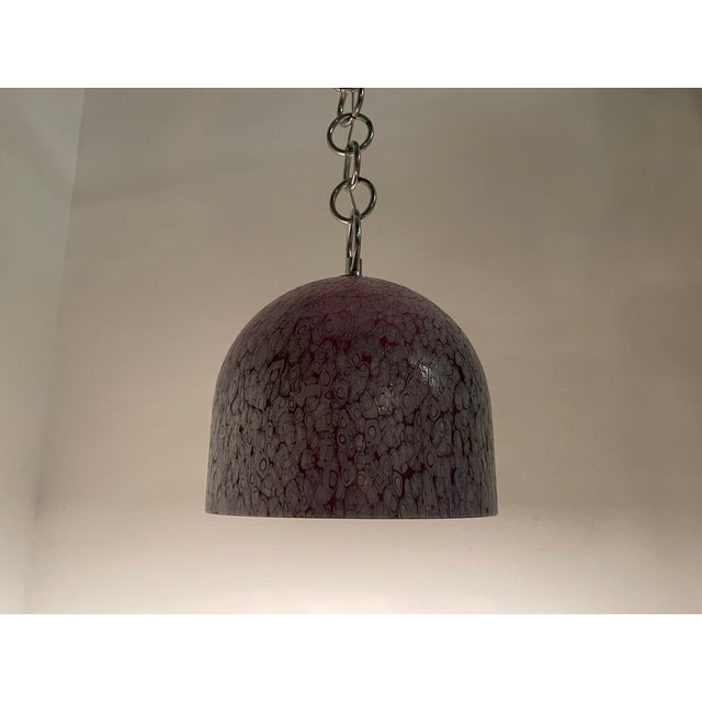 Murano glass light pendant neverrino attributed to gae aulenti 1970s the murano glass shade when illuminated it turns a...