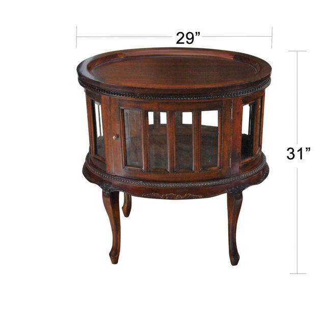 The Oval Tray Top Mahogany Display Table from Niagara Furniture is an exercise in elegance. The sweeping mahogany legs are...