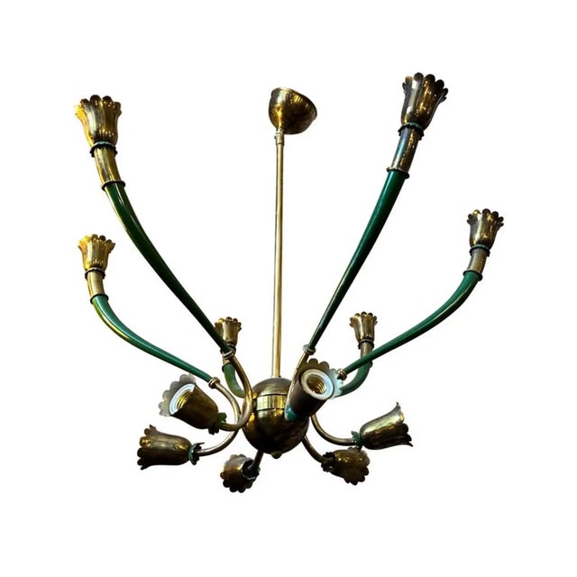 A green metal and brass chandelier designed and manufactured in Italy in the Sixties in the manner of Stilnovo, it's in...