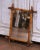 Decorate a hall way or powder room with this charming antique spindle-turned wooden mirror. Crafted in France circa 1920,...