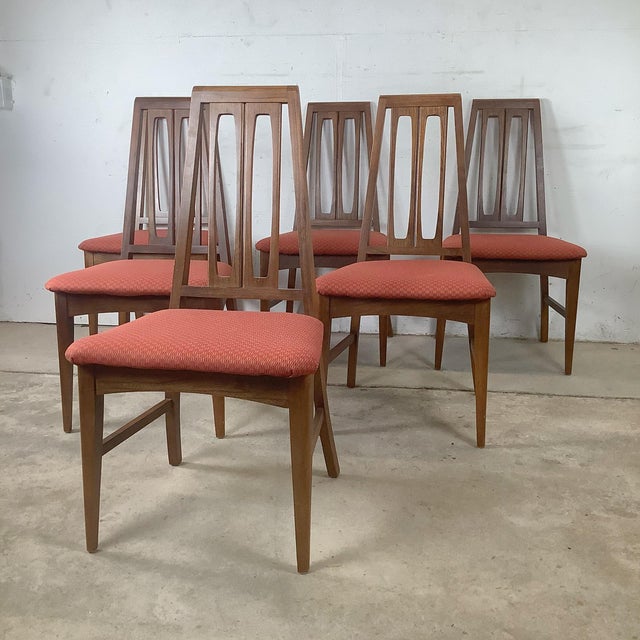 This exceptional set of six dining chairs by Young Manufacturing represents the pinnacle of 1960s American furniture...