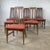 This exceptional set of six dining chairs by Young Manufacturing represents the pinnacle of 1960s American furniture...