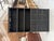 This antique patinated grocer’s cabinet has been fully restored. It features three large shelves and twelve functional...