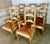 Set of eight French Provincial Ladderback armchairs with rush seats, crafted by Le Monde du Bois, a French furniture...