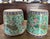 Absolutely stunning pair of turquoise ground famille rose cachepots with loveliest enameled decoration. Brilliant...