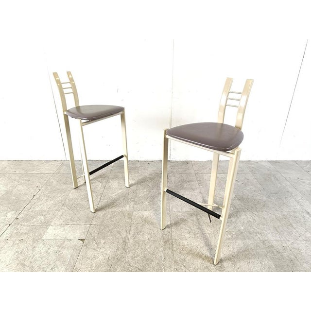 Vintage postmodern bar stools with a white metal frame and grey skai seats. 1980s - Italy Very good condition Dimensions:...