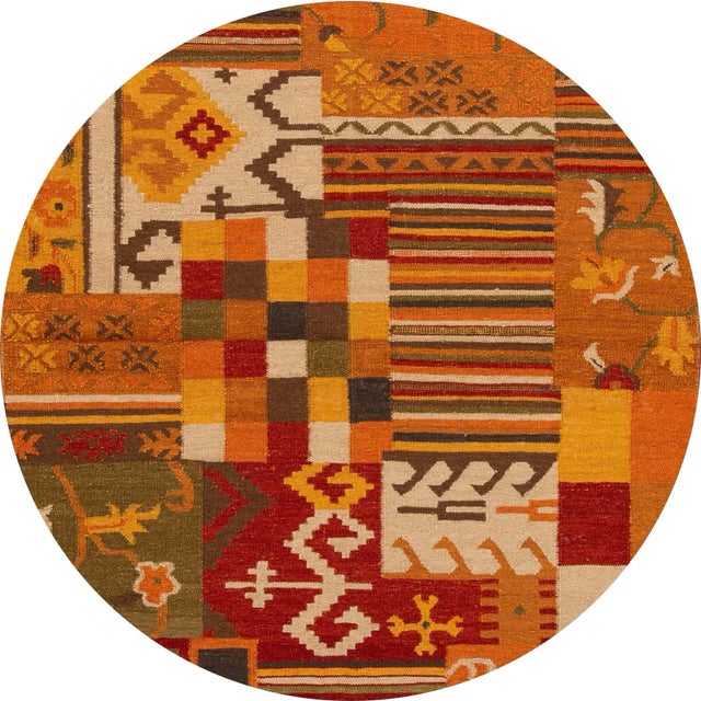 A beautiful hand-woven modern Kilim rug with a multi-color field in an all-over geometric design. This rug measures: 4...