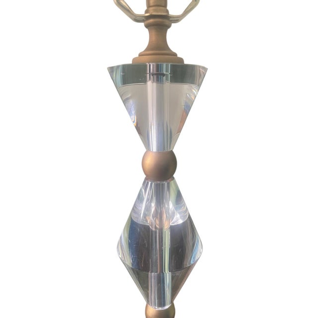 A refined and sculptural pair of table lamps from Currey & Company, model Quaintrelle, distinguished by their faceted...