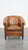 We offer this distinctive sheepskin club chair with a rugged, worn look and a beautiful patina. Well-worn but also...
