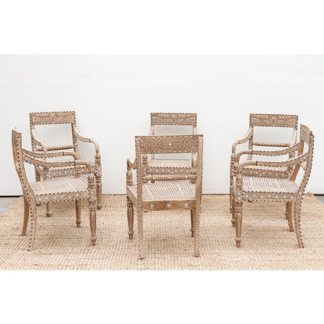 Introduce a touch of refined elegance and historical charm to your dining or living space with this set of six beautifully...