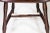 This authentic period American 7 spindle bow (or hoop) back Windsor side chair boasts a very early repaint in brown over...