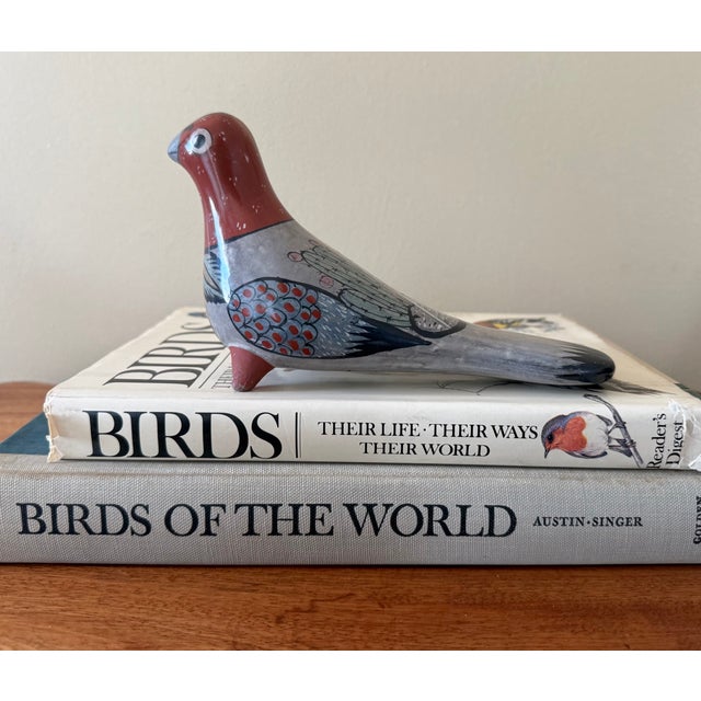 Authentic Tonalá ceramic bird sculpture from the region of Jalisco, Mexico. Hand-painted in tones of burnt orange, gray...