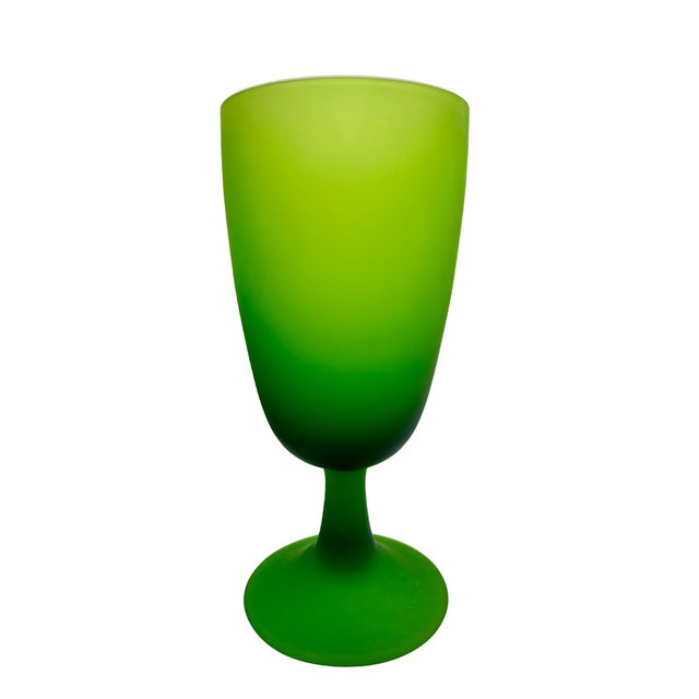 A striking set of 11 Italian satin-finish art glass goblets in a vibrant, luminous green, attributed to Carlo Moretti....