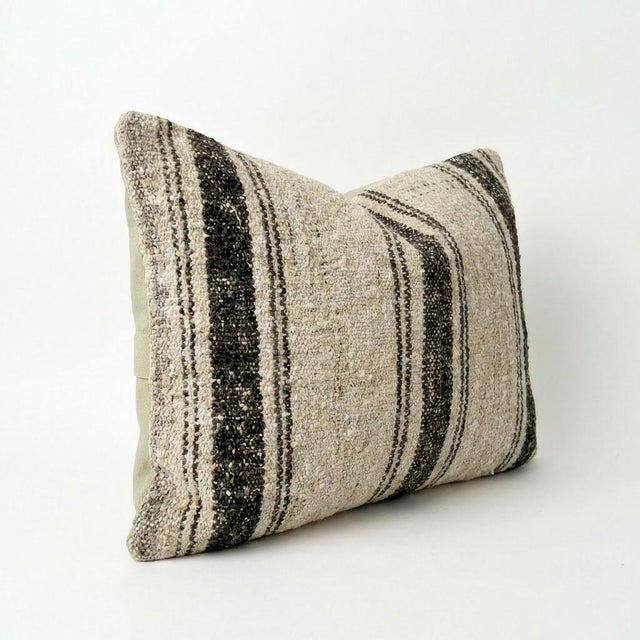 This beautiful 14'' x 20'' Turkish Kilim pillow cover was made from authentic handwoven flatweave kilim. The traditional...