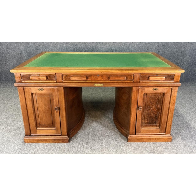 We are proud to present a very rare early 1900’s Walnut Wooton’s Rotary Desk with a striking green felt top. This...