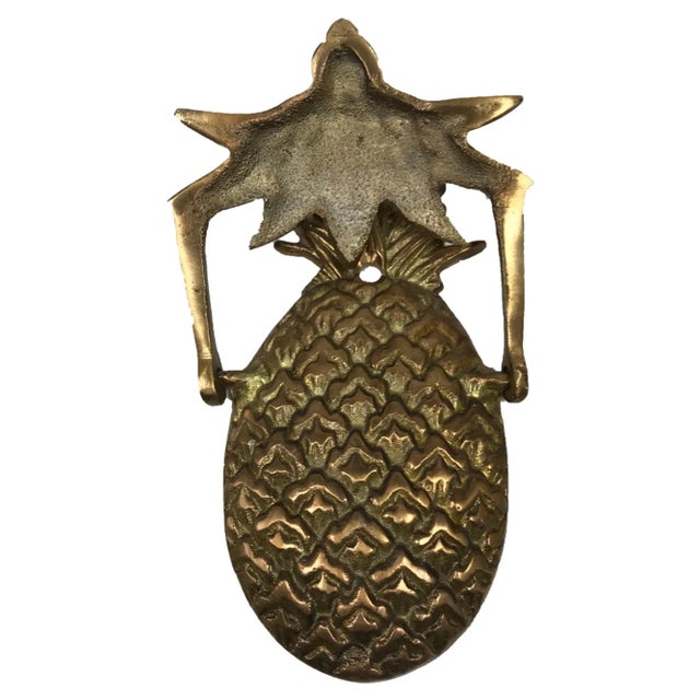 Our elegant Antiqued Brass Pineapple Door Knocker is a Colonial reproduction. In Colonial times and today, pineapples...