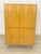 Beautiful, two-door cabinet made of light wood with delicate legs, as seen in the attached pictures. The cabinet impresses...