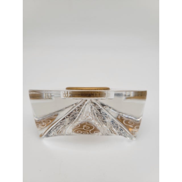 Luxurious Crystal Clock Sculpture with a Round Ivory Clock Face, Bezelled in Gold and "Baccarat" in Cursive on the Face....