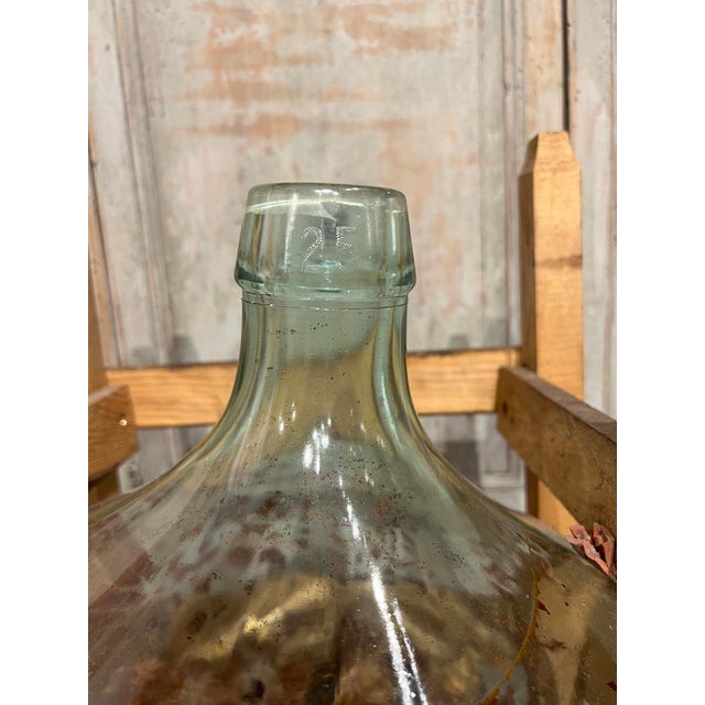 More information coming soon… This painted demi john bottle is quite a find, as the vessel is still nestled in its...