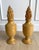 A unique pair of handcrafted turned wood urns with a distinctive blend of classical form and sculptural artistry....