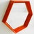 What a gem, this mid-century space age pop art hexagon mirror in orange, made of plastic from the 1970s. The retro orange...