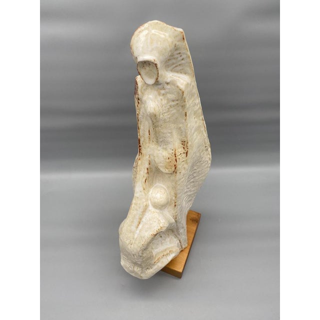 * A figure / sculpture * Abstract statuette / Figurine * Material: ceramic on wooden base * Artist: Leandro Lega * Leandro...