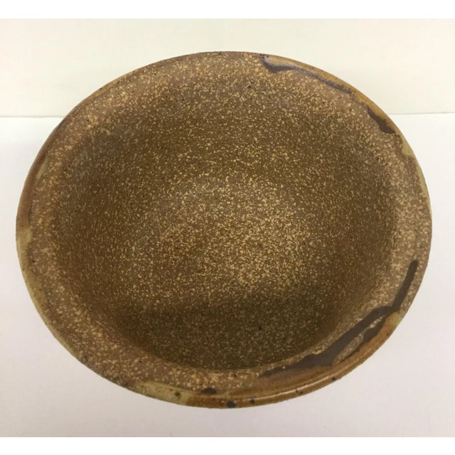 A beautiful bowl to do whatever you like. Eat in it. Cook in it. Plant a flower in it. Use it in your garden for a bird...