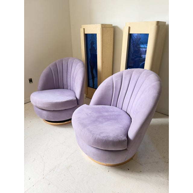 Fabulous and iconic at this point, a tagged Milo Baughman neo-art-deco design that’s highly comfortable and they swivel....