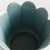 In a classic silhouette with petal edges, this footed pot is natureinspired. Finished in a soft sage reactive glaze, it is...