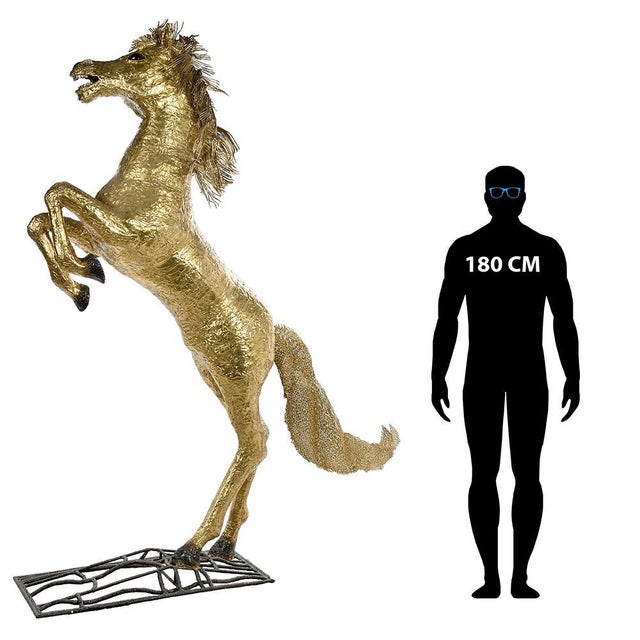 Large sculpture representing a horse which rears entirely out of carved brass signed Henri Fernandez. This piece is...