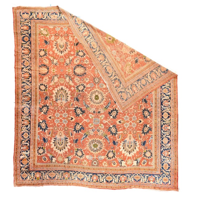 The mellow rust madder ground shows a three column pattern of serrated rosettes up the centre and flanked by triples of...