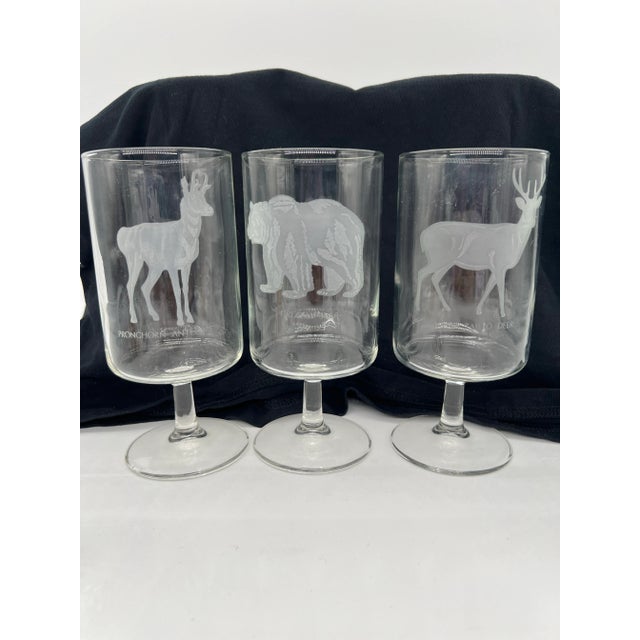 Set of five Georg Jensen etched glasses featuring wildlife. Animals represented are the grizzly bear, white-tailed deer,...