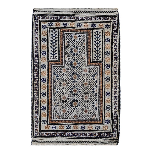 Early 20th Century Baluch Tribal Area Rug in a Prayer Pattern in Ivory, Brown, Navy Blue For Sale
