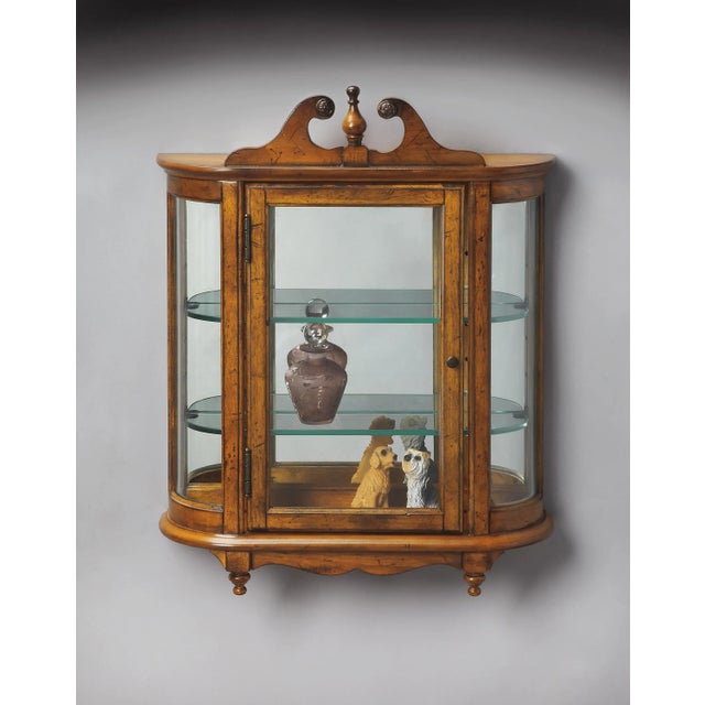 This distinctive wall curio is both functional and beautiful with two adjustable glass shelves and a mirrored back to...