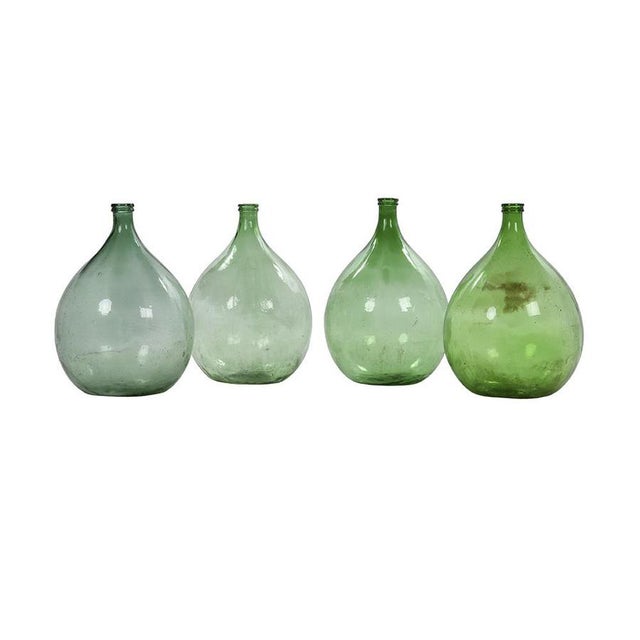 Dame-Jeanne. (Vases are sold individually) This piece is designed in the style of the selected designer and/or manufacturer