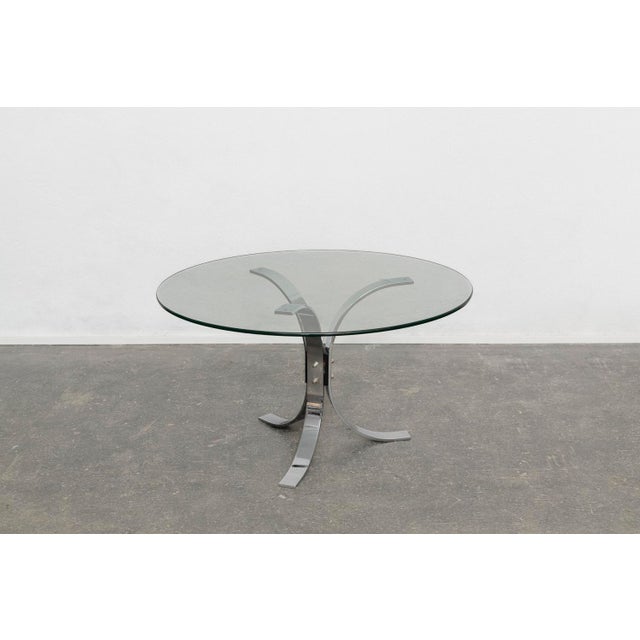Chrome and Glass Coffee Table in the style of Roger Sprunger, 1970s, in Very Good conditions. Designed 1970 to 1979