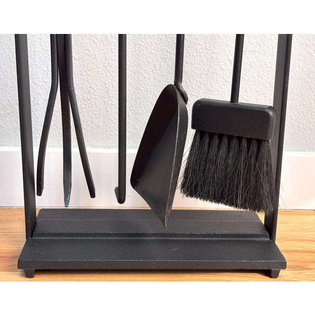 This midcentury-era fireplace tool set will look just right in a contemporary/modernist setting. Made in the USA by the...