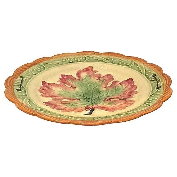Vintage, Japanese, majolica, plate with maple leaf motif and scalloped edge. Stylized leaf patterned frieze along the...