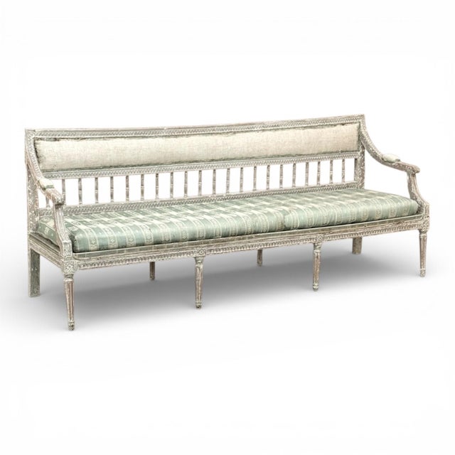 A grand and beautifully proportioned 18th century Gustavian period bench, embodying the refined elegance of the Louis XVI...