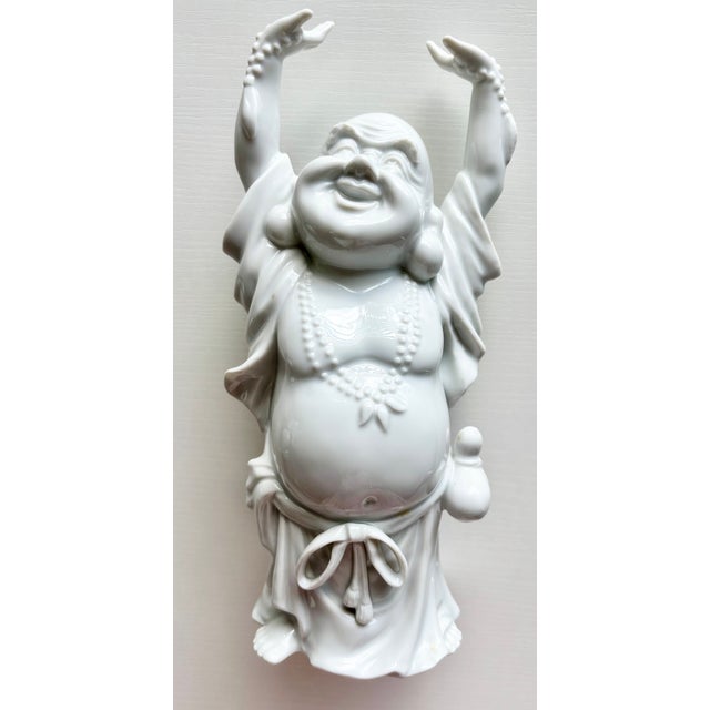 This happy Buddha porcelain figurine has been in my mother’s curio for decades. His happy expression brings much joy and...